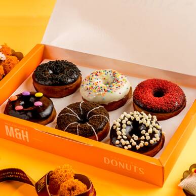The Sweet Impact of Donut Boxes: Packaging That Protects, Preserves, and Promotes